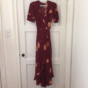 Short sleeve burgundy wrap dress with high-low hem